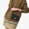 Aren Kettenbrieftasche aus geprägtem Monogram-Leder Aren Kettenbrieftasche aus geprägtem Monogram-Leder