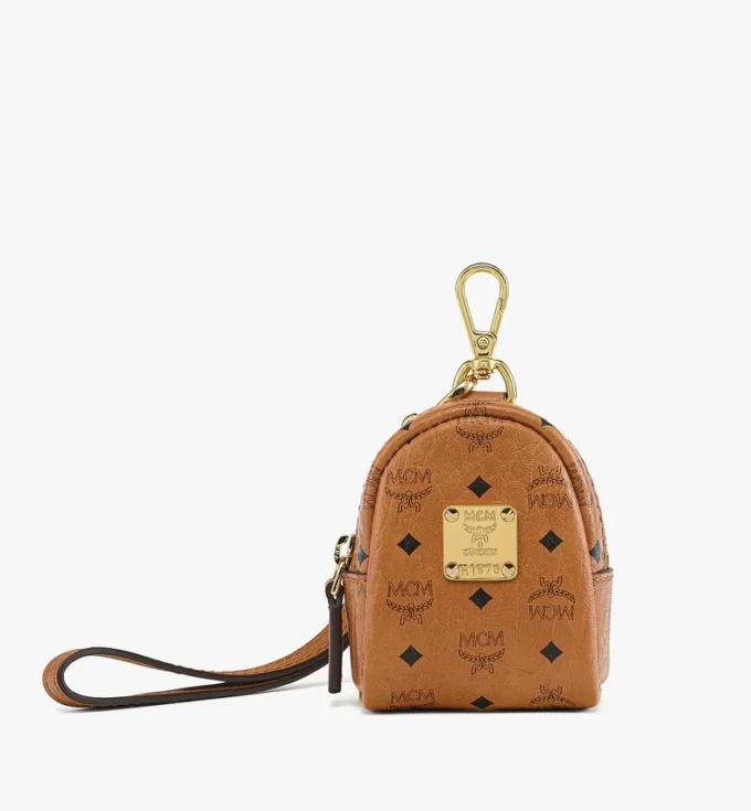 Gassi-Beutelspender mit Handschlaufe aus Leder mit Monogram-Print Gassi-Beutelspender mit Handschlaufe aus Leder mit Monogram-Print