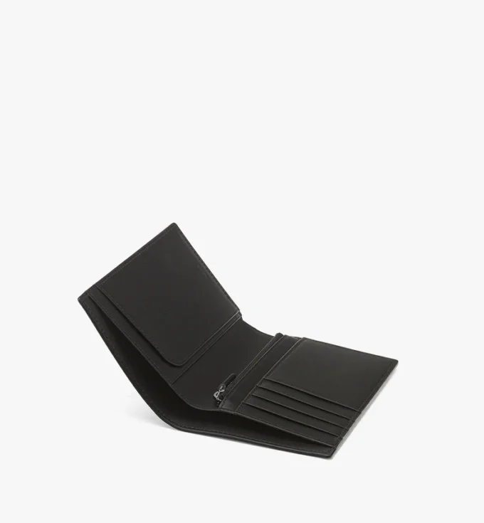 Ottomar-Reisepasshülle aus Leder mit Maxi Monogram Ottomar-Reisepasshülle aus Leder mit Maxi Monogram