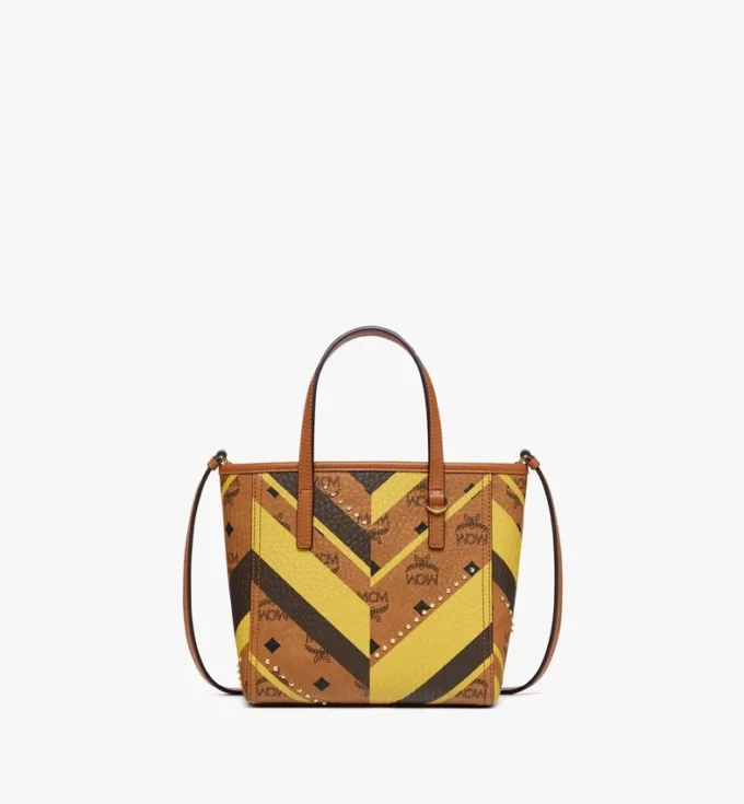 Toni Shopper mit Reißverschluss oben und Nieten in Mega Herringbone Visetos Toni Shopper mit Reißverschluss oben und Nieten in Mega Herringbone Visetos