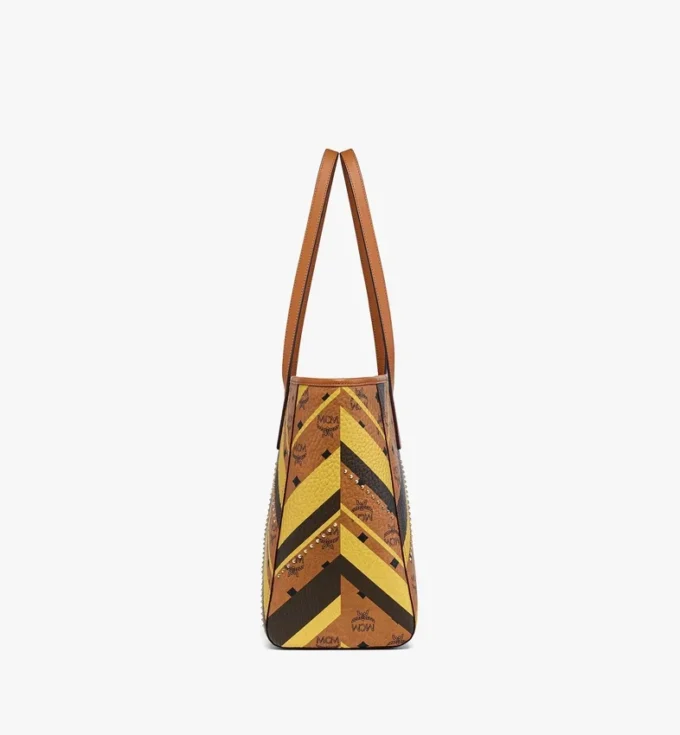 Toni Shopper mit Reißverschluss oben und Nieten in Mega Herringbone Visetos Toni Shopper mit Reißverschluss oben und Nieten in Mega Herringbone Visetos
