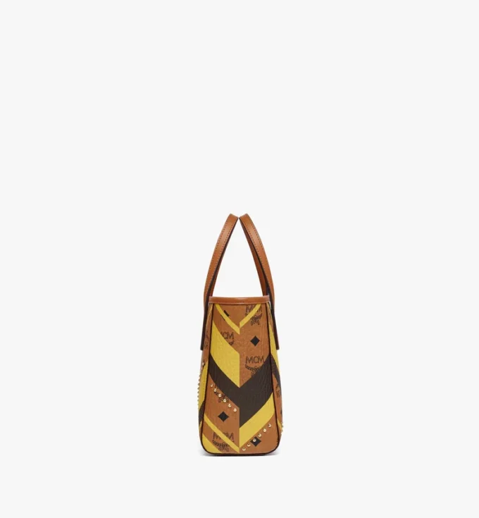 Toni Shopper mit Reißverschluss oben und Nieten in Mega Herringbone Visetos Toni Shopper mit Reißverschluss oben und Nieten in Mega Herringbone Visetos