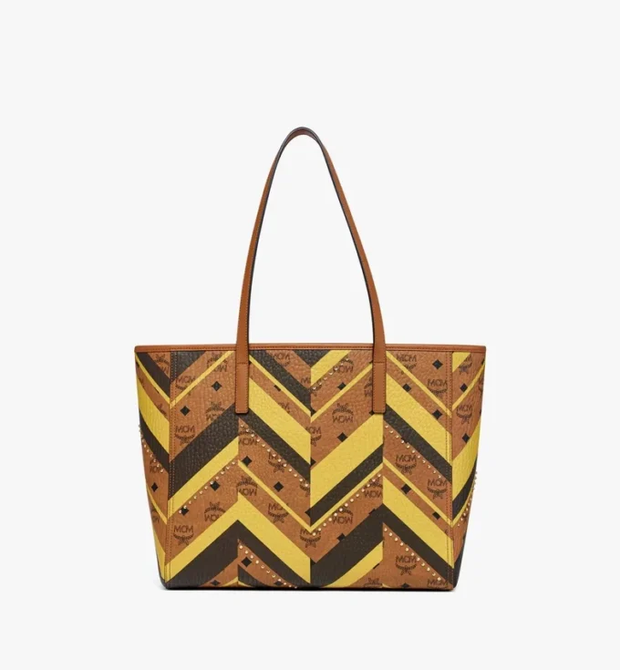 Toni Shopper mit Reißverschluss oben und Nieten in Mega Herringbone Visetos Toni Shopper mit Reißverschluss oben und Nieten in Mega Herringbone Visetos