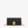 Tracy-Kettenbrieftasche aus geprägtem Monogramm-Leder Tracy-Kettenbrieftasche aus geprägtem Monogramm-Leder